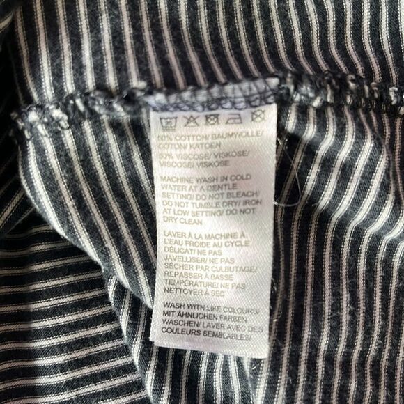 Manguun short sleeve ruffled hem t shirt - Picture 9 of 9